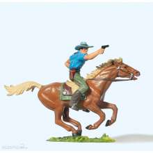 Preiser 54819 - 1:25 Cowboy, reitend m. Rev.